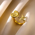 Anillo Ajustable Caracola y Estrella en Acero Dorado