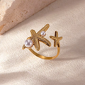 Anillo Ajustable Doble Estrella de Mar con Perlas en Acero Dorado
