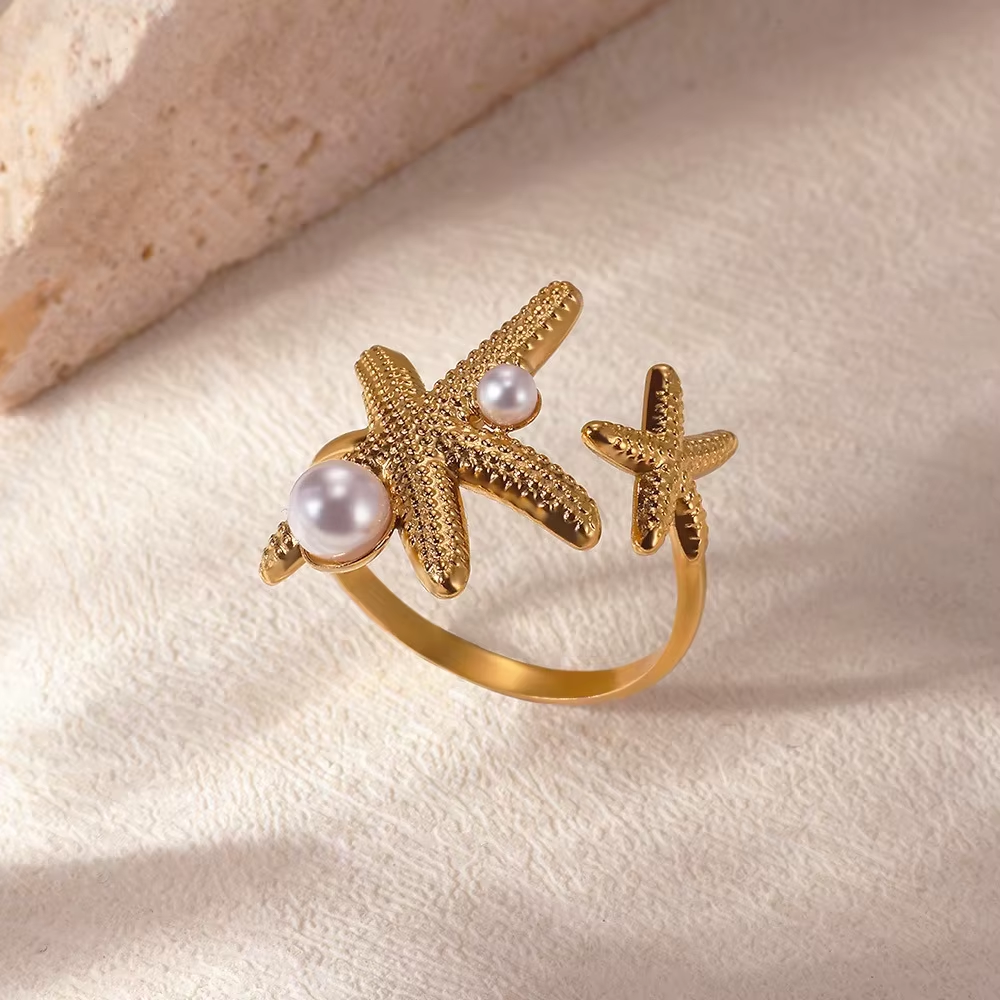 Anillo Ajustable Doble Estrella de Mar con Perlas en Acero Dorado