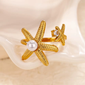Anillo Ajustable Estrellas de Mar con Perla en Acero Dorado